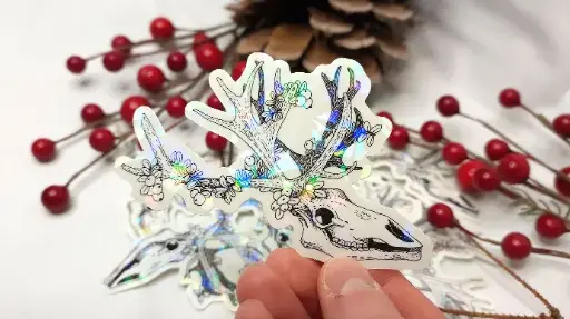 Snowberries on reindeer skull - Clear sticker - Holographic laminate